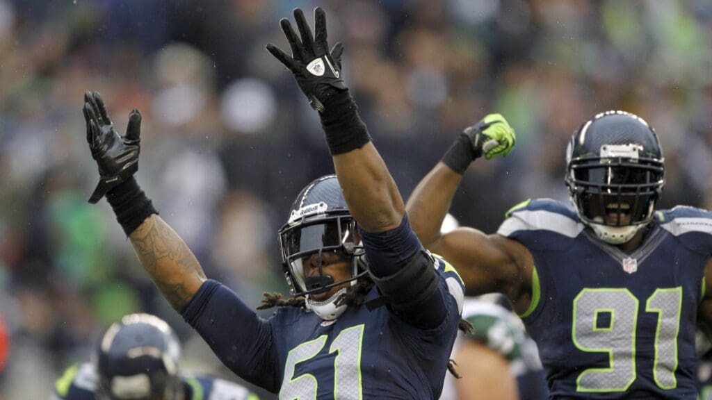 Nov 11, 2012; Seattle, WA, USA; Seattle Seahawks defensive end Bruce Irvin (51) celebrates a sack against the New York Jets during the third quarter at CenturyLink Field