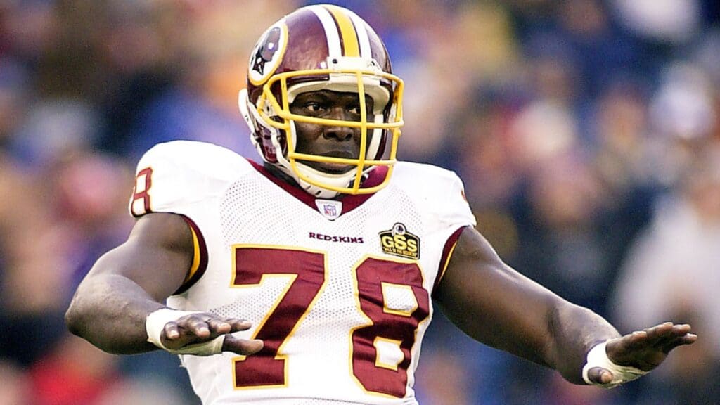 Oct 19, 2003; Orchard Park, NY, USA: FILE PHOTO; Washington Redskins defensive end Bruce Smith (78) gestures on the field against the Buffalo Bills at Ralph Wilson Stadium.