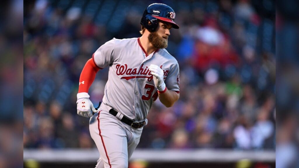 Apr 26, 2017; Denver, CO, USA; Washington Nationals right fielder Bryce Harper (34) runs out a single in the fifth inning against the Colorado Rockies at Coors Field.