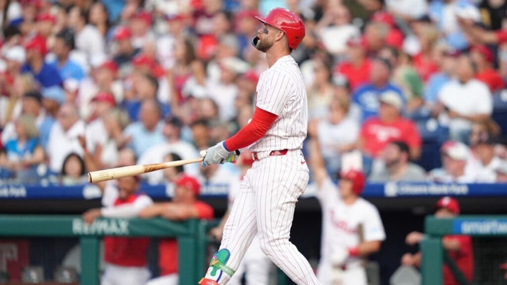Jul 23, 2025; Philadelphia, Pennsylvania, USA; Philadelphia Phillies infielder Bryce Harper (3) watches the ball after hitting a home run against the Boston Red Sox in the first inning at Citizens Bank Park.