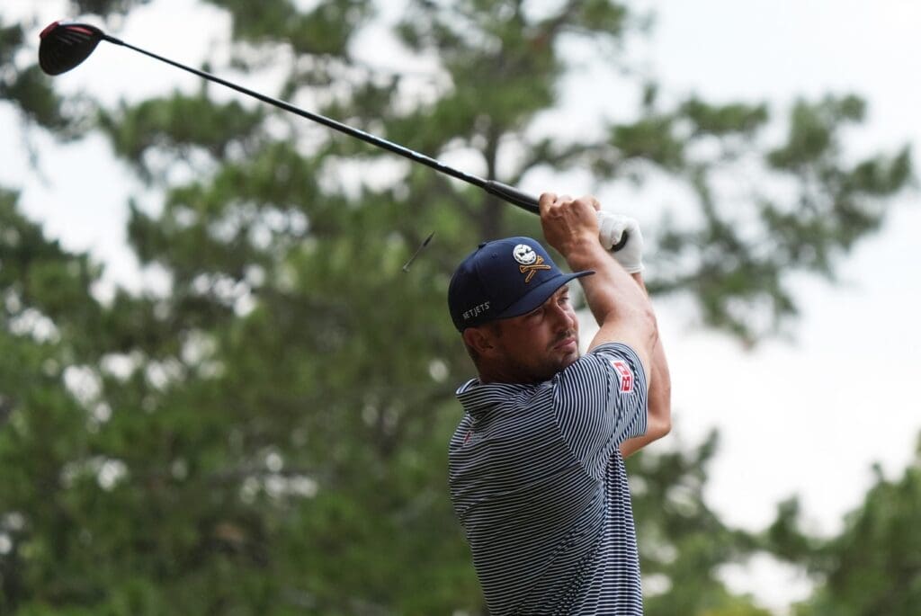Jun 16, 2024; Pinehurst, North Carolina, USA; Bryson DeChambeau plays his shot from the second tee box during the final round of the U.S. Open golf tournament. 
