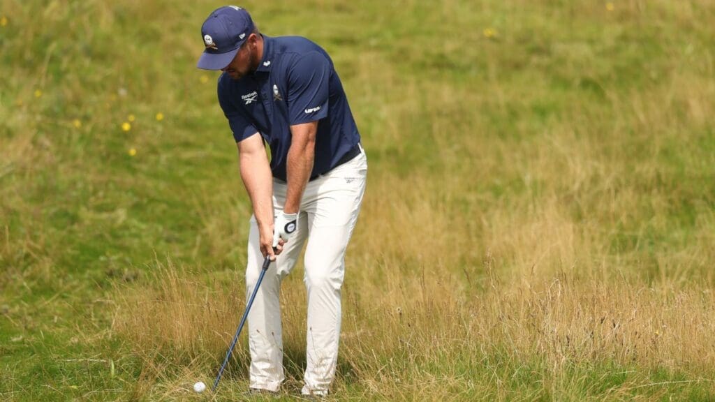 Jul 20, 2025; Portrush, IRL; Bryson Dechambeau hits from the rough on the 15th hole during the final round of The 153rd Open Championship golf tournament at Royal Portrush.