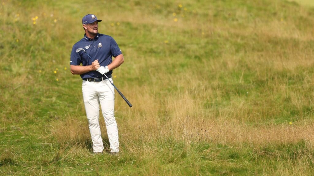 Jul 20, 2025; Portrush, IRL; Bryson Dechambeau hits from the rough on the 15th hole during the final round of The 153rd Open Championship golf tournament at Royal Portrush.