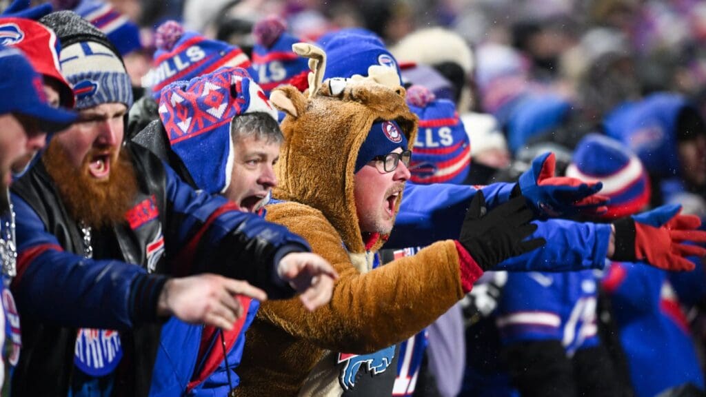 Jan 19, 2025; Orchard Park, New York, USA; Buffalo Bills fans cheer during the fourth quarter against the Baltimore Ravens in a 2025 AFC divisional round game at Highmark Stadium.
