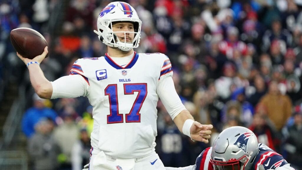 Dec 26, 2021; Foxborough, Massachusetts, USA; Buffalo Bills quarterback Josh Allen (17) throws a pass against the New England Patriots in the second quarter at Gillette Stadium.
