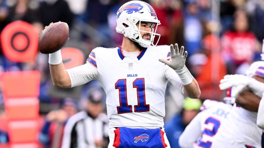 Jan 5, 2025; Foxborough, Massachusetts, USA; Buffalo Bills quarterback Mitchell Trubisky (11) looks to throw against the New England Patriots during the first half at Gillette Stadium.