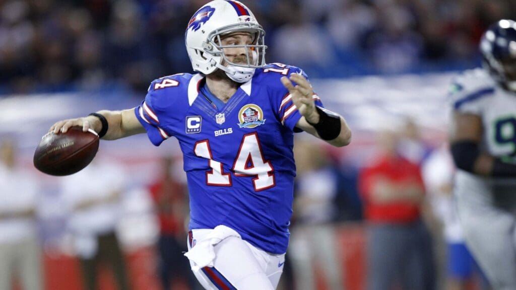 December 16, 2012; Toronto, ON, Canada; Buffalo Bills quarterback Ryan Fitzpatrick (14) throws a pass against the Seattle Seahawks at the Rogers Centre. Seattle defeated Buffalo 50-17.