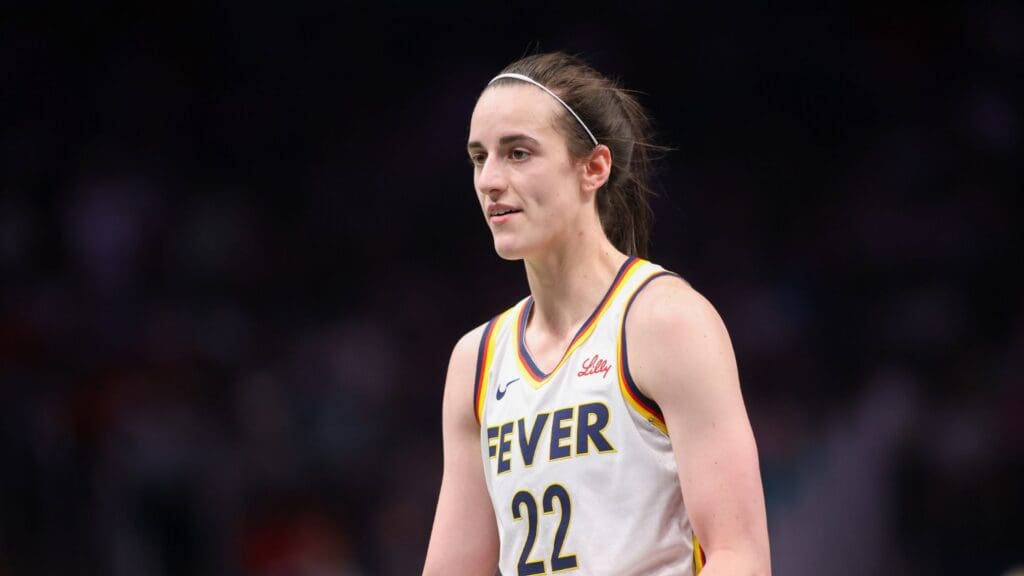 May 22, 2025; Atlanta, Georgia, USA; Indiana Fever guard Caitlin Clark (22) in action against the Atlanta Dream in the first half at State Farm Arena. 