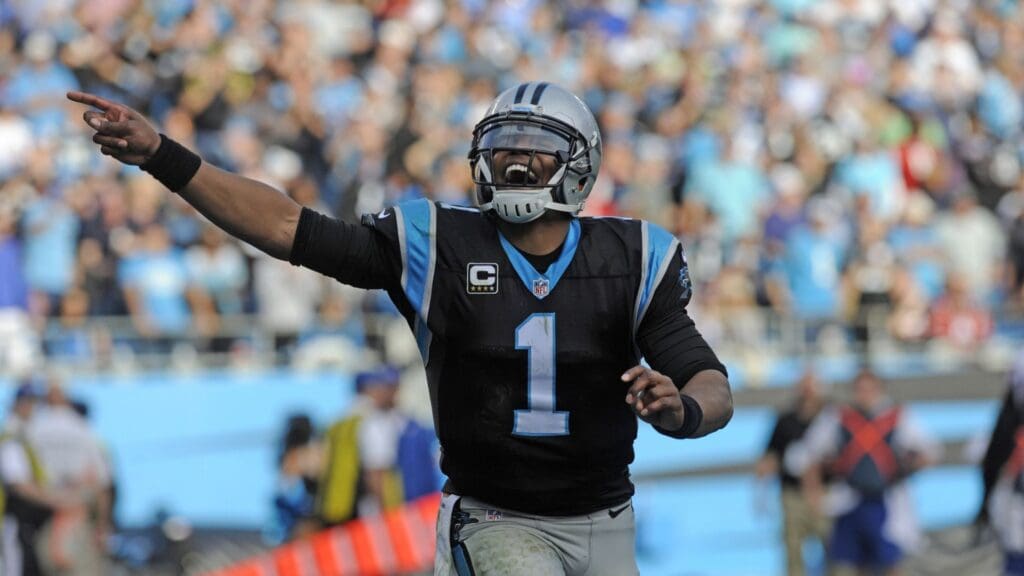 Dec 13, 2015; Charlotte, NC, USA; Carolina Panthers quarterback Cam Newton (1) celebrates after his team scores a touchdown during the second half of the game against the Atlanta Falcons at Bank of America Stadium.