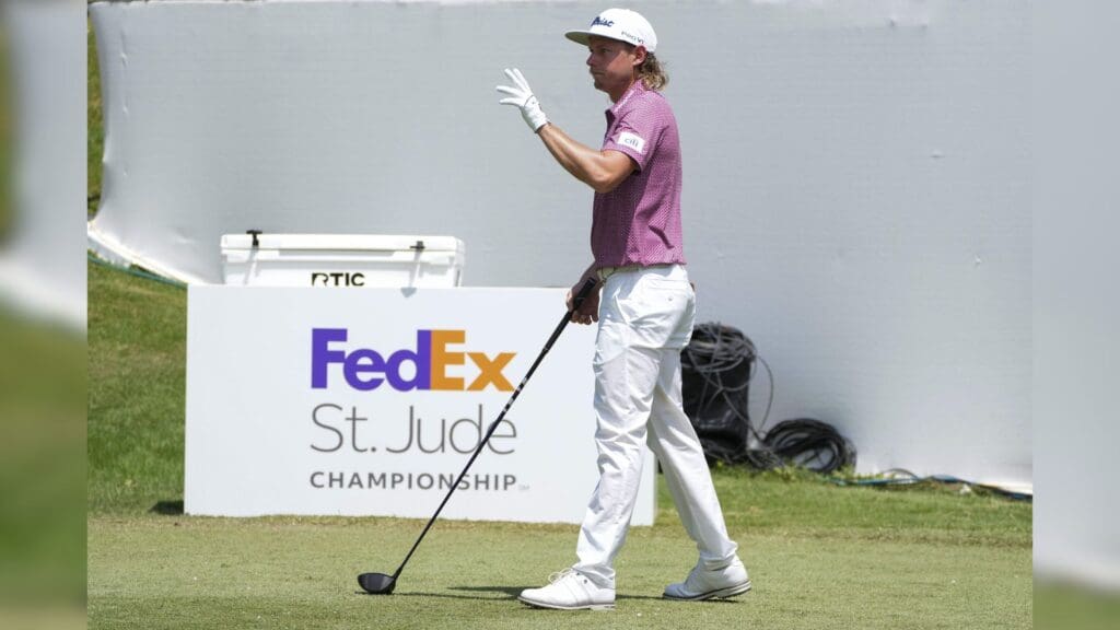 Aug 14, 2022; Memphis, Tennessee, USA; Cam Smith waves to the fans as he s introduced during the final round of the FedEx St. Jude Championship golf tournament at TPC Southwind.
