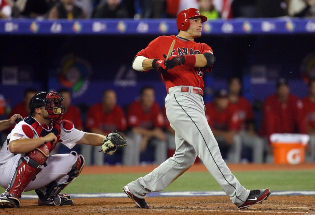 Mar 7, 2009; Toronto, ON, Canada; Canada designated hitter Joey Votto (19) hits a broken bat single in the 9th inning against USA during first round pool play at the 2009 World Baseball Classic at the Rogers Centre in Toronto, ON. USA beat Canada 6-5.