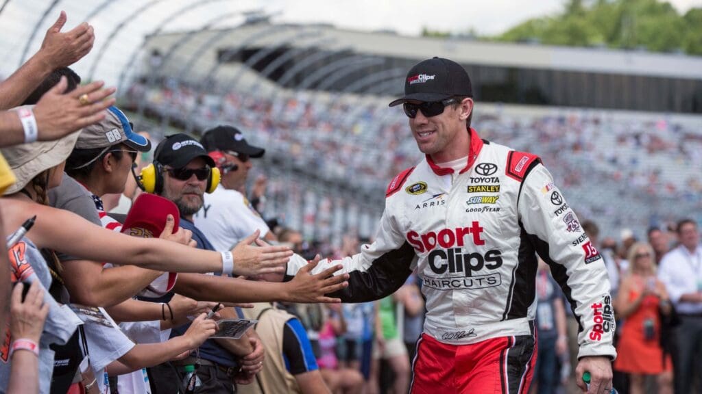 Jul 17, 2016; Loudon, NH, USA; Sprint Cup Series driver Carl Edwards (19) is introduced before the New Hampshire 301 at the New Hampshire Motor Speedway.