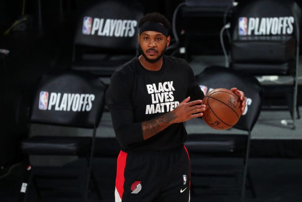 Aug 20, 2020; Lake Buena Vista, Florida, USA; Portland Trail Blazers forward Carmelo Anthony (00) warms up before a NBA basketball first round playoff game against the Los Angeles Lakers in the 2020 NBA playoffs at AdventHealth Arena.