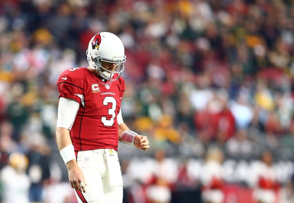 Dec 27, 2015; Glendale, AZ, USA; Arizona Cardinals quarterback Carson Palmer (3) reacts against the Green Bay Packers at University of Phoenix Stadium.