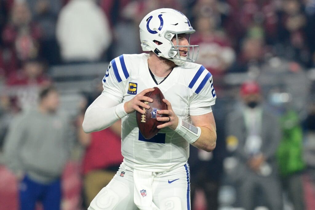 Dec 25, 2021; Glendale, Arizona, USA; Indianapolis Colts quarterback Carson Wentz (2) drops back to pass against the Arizona Cardinals during the first half at State Farm Stadium.