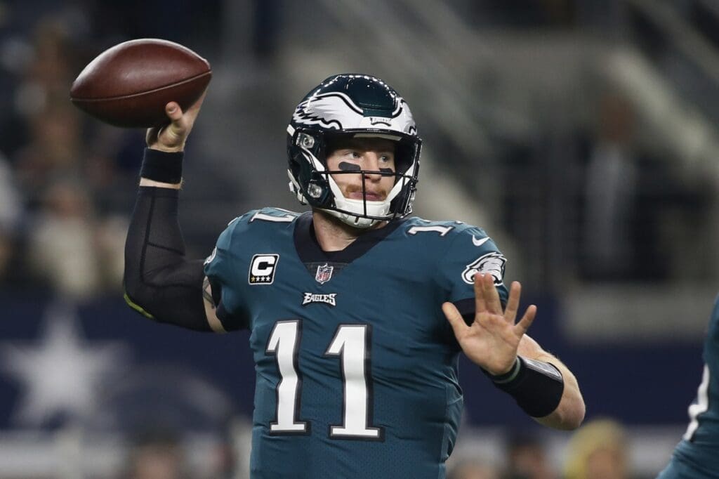 Nov 19, 2017; Arlington, TX, USA; Philadelphia Eagles quarterback Carson Wentz (11) throws a pass in the first quarter against the Dallas Cowboys at AT&T Stadium.