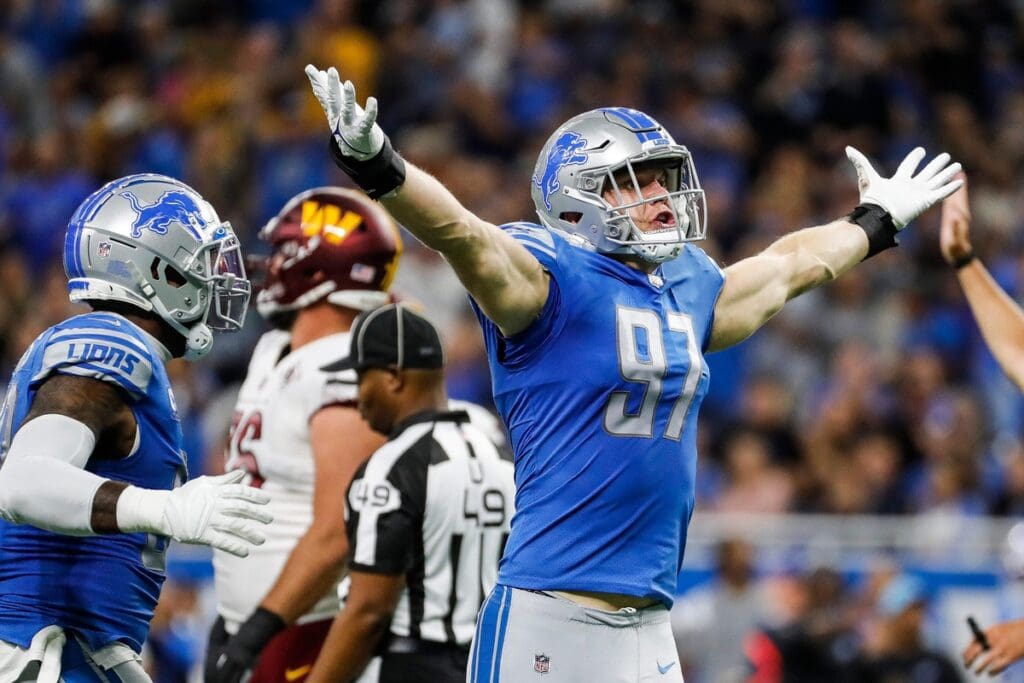 Detroit Lions defensive end Aidan Hutchinson celebrates a sack against Washington Commanders quarterback Carson Wentz during the first half at Ford Field, Sept. 18, 2022. Nfl Washington Commanders At Detroit Lions