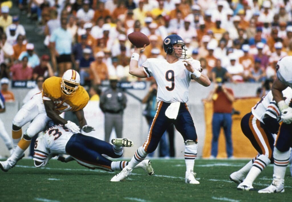 Oct 25, 1987; Tampa, FL, USA; Chicago Bears quarterback Jim McMahon (9) drops back to pass against the Tampa Bay Buccaneers at Tampa Stadium.