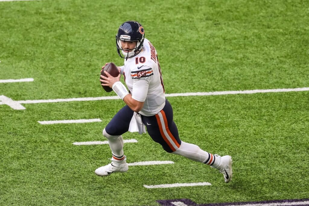 Dec 20, 2020; Minneapolis, Minnesota, USA; Chicago Bears quarterback Mitchell Trubisky (10) runs with the ball during the second quarter against the Minnesota Vikings at U.S. Bank Stadium.