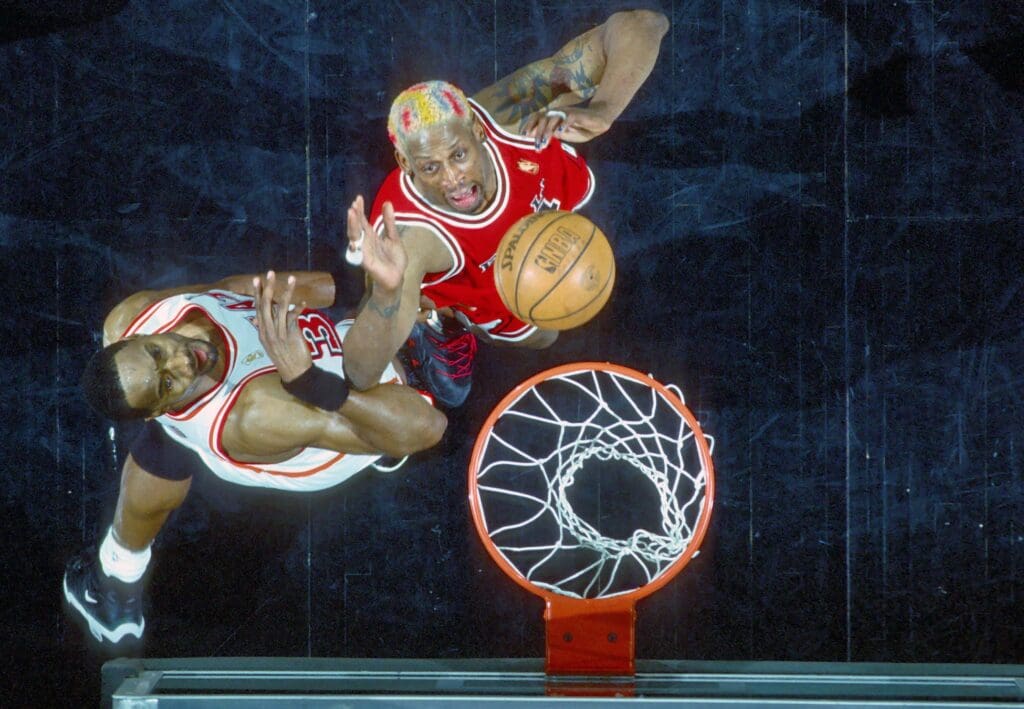 Unknown Date 1997; Miami, FL, USA; FILE PHOTO; Chicago Bulls forward #91 DENNIS RODMAN looks to rebound against Miami Heat center ALONZO MOURNING at the Miami Arena during the 1996-97 season.
