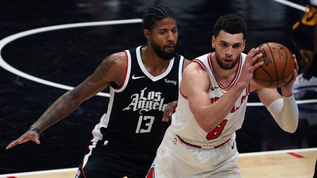 Jan 10, 2021; Los Angeles, California, USA; Chicago Bulls guard Zach LaVine (8) is defended by LA Clippers guard Paul George (13) in the fourth quarter at Staples Center. The Clippers defeated the Bulls 130-127.