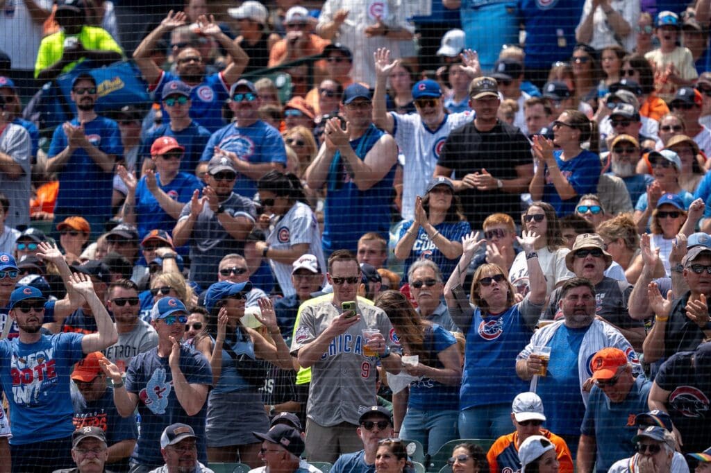 Chicago Cubs fans cheer after a home run against the Detroit Tigers at Comerica Park in Detroit on Saturday, June 7, 2025.
