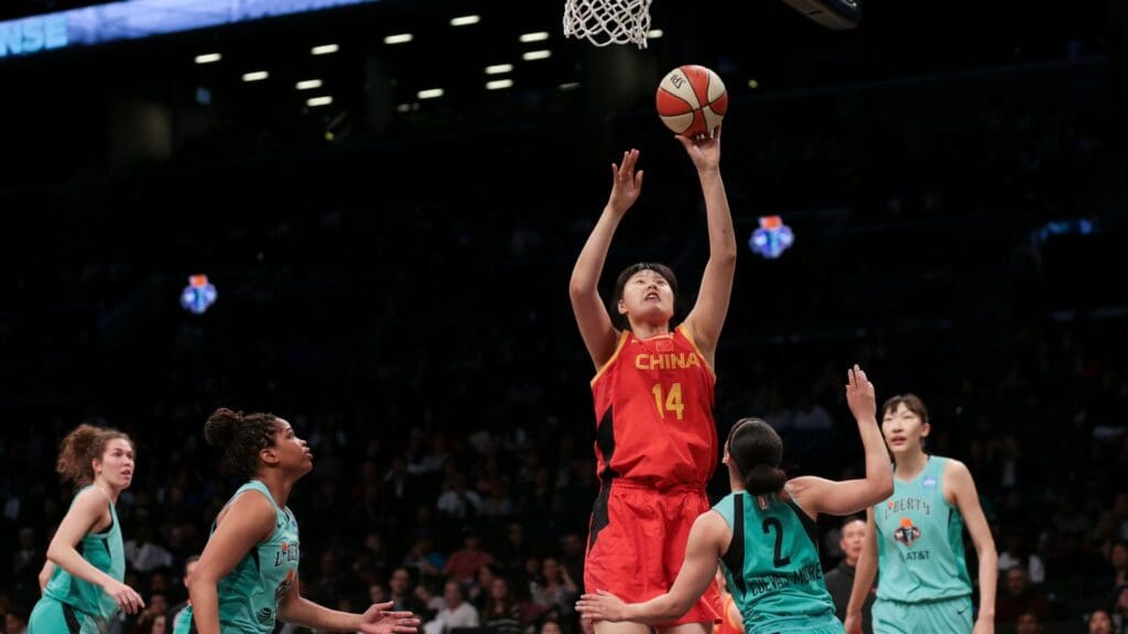 May 9, 2019; New York City, NY, USA; China National Team center Li Yueru (14) shoots the ball over China National Team center Sun Mengran (2) during the second half of the preseason WNBA game at Barclays Center.