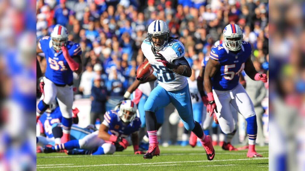 Oct 21, 2012; Orchard Park, NY, USA; Tennessee Titans running back Chris Johnson (28) runs against the Buffalo Bills during the fourth quarter at Ralph Wilson Stadium. Titans beat the Bills 35-34.