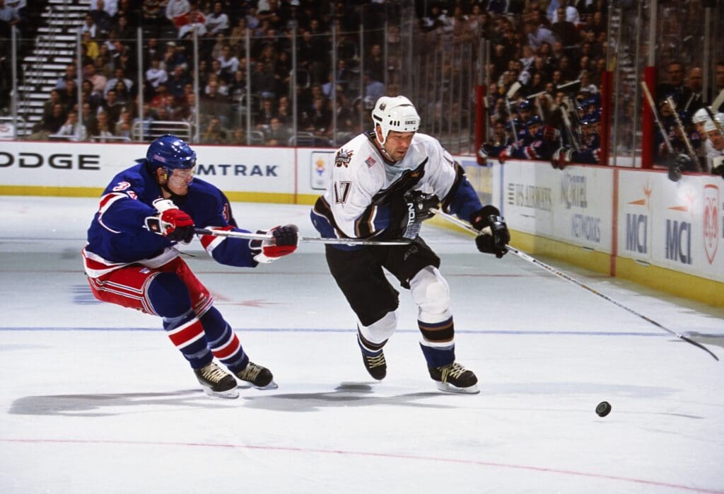 Unknown Date, 2001; Washington, DC, USA; FILE PHOTO; Washington Capitals left wing Chris Simon (17) in action against New York Rangers defensemen Bryan Berard (34) at the MCI Center.