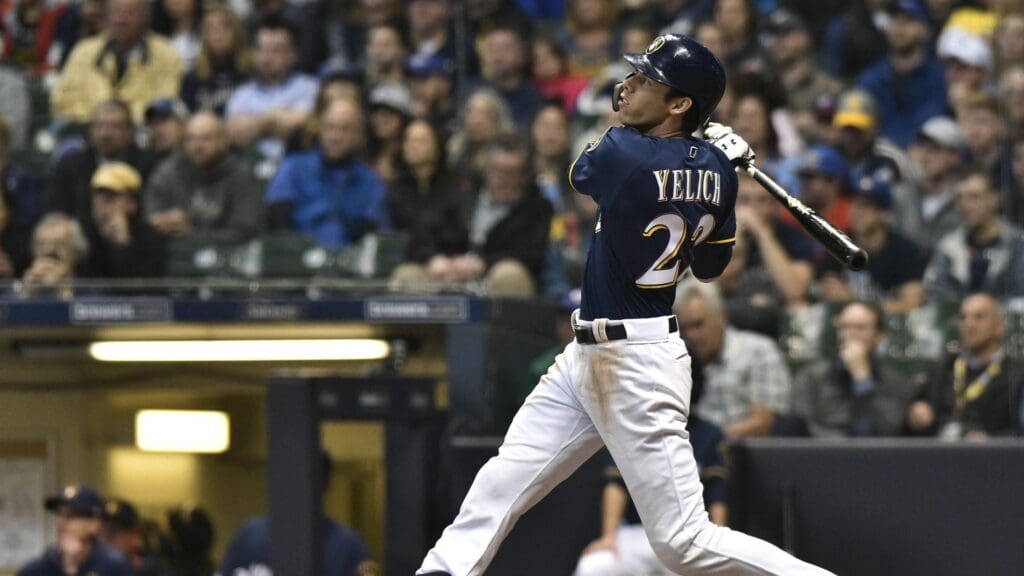 Apr 16, 2019; Milwaukee, WI, USA; Milwaukee Brewers Christian Yelich (22) hits a home run against the St. Louis Cardinals in the 5th inning at Miller Park
