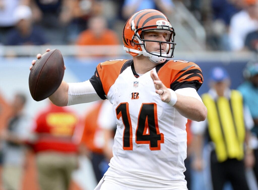 Sep 8, 2013; Chicago, IL, USA; Cincinnati Bengals quarterback Andy Dalton (14) drops back to pass against the Chicago Bears during the fourth quarter at Soldier Field. Chicago defeats Cincinnati 24-21.