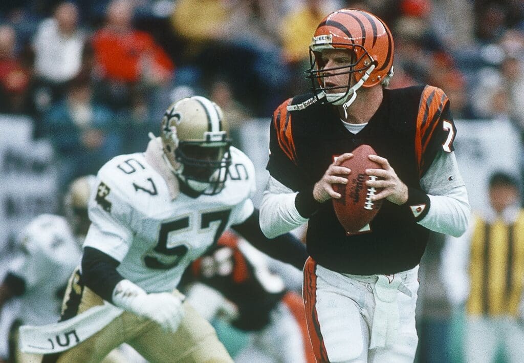 Dec 20, 1987; Cincinnati, OH, USA; FILE PHOTO; Cincinnati Bengals quarterback Boomer Esiason (7) in action against New Orleans Saints linebacker Rickey Jackson (57) at Riverfront Stadium.