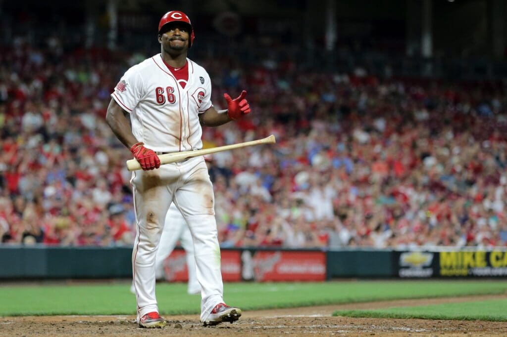 Cincinnati Reds right fielder Yasiel Puig (66) reacts after striking out in the eighth inning of an MLB baseball game against the St. Louis Cardinals, Friday, July 19, 2019, at Great American Ball Park in Cincinnati. St Louis Cardinals At Cincinnati Reds July 19