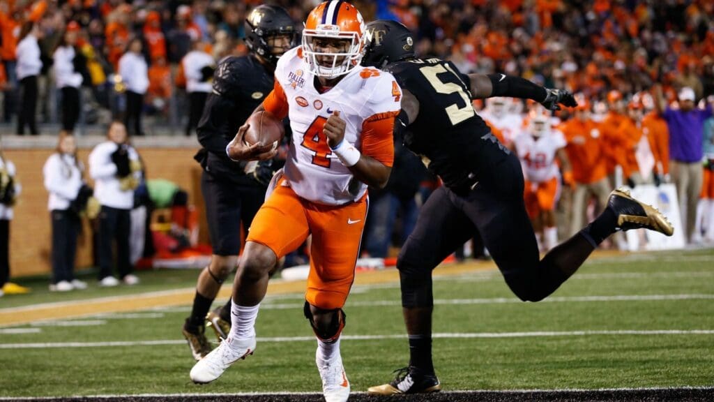 Nov 19, 2016; Winston-Salem, NC, USA; Clemson Tigers quarterback Deshaun Watson (4) runs in for a touchdown during the second quarter against the Wake Forest Demon Deacons at BB&T Field.