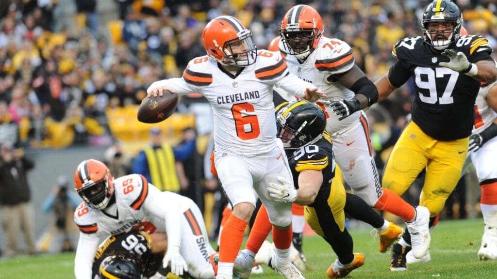Oct 28, 2018; Pittsburgh, PA, USA; Cleveland Browns quarterback Baker Mayfield (6) is pressured by Pittsburgh Steelers linebacker T.J. Watt (90) in the third quarter at Heinz Field. The Steelers won 33-18.