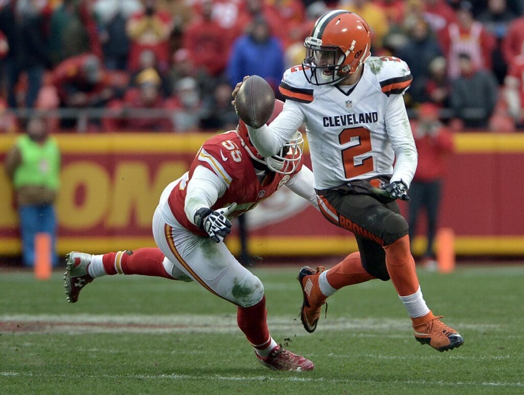 Dec 27, 2015; Kansas City, MO, USA; Cleveland Browns quarterback Johnny Manziel (2) looks to pass and is pressured by Kansas City Chiefs linebacker Dee Ford (55) during the second half at Arrowhead Stadium. The Chiefs won 17-13.