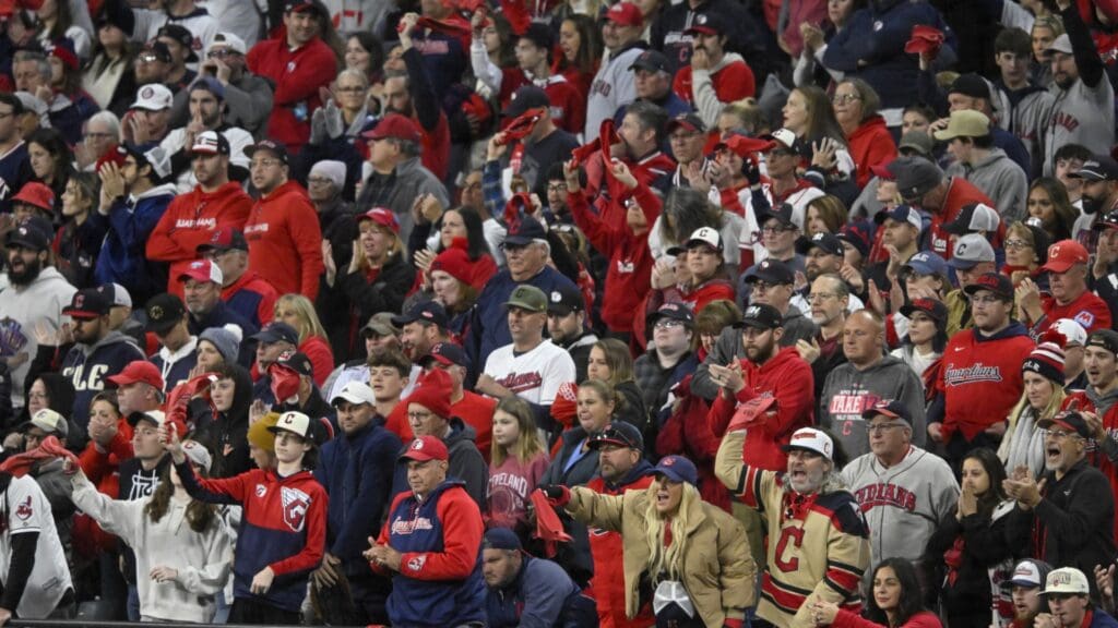 Oct 18, 2024; Cleveland, Ohio, USA; Cleveland Guardians fans cheer in the fifth inning against the New York Yankees during game four of the ALCS for the 2024 MLB playoffs at Progressive Field.