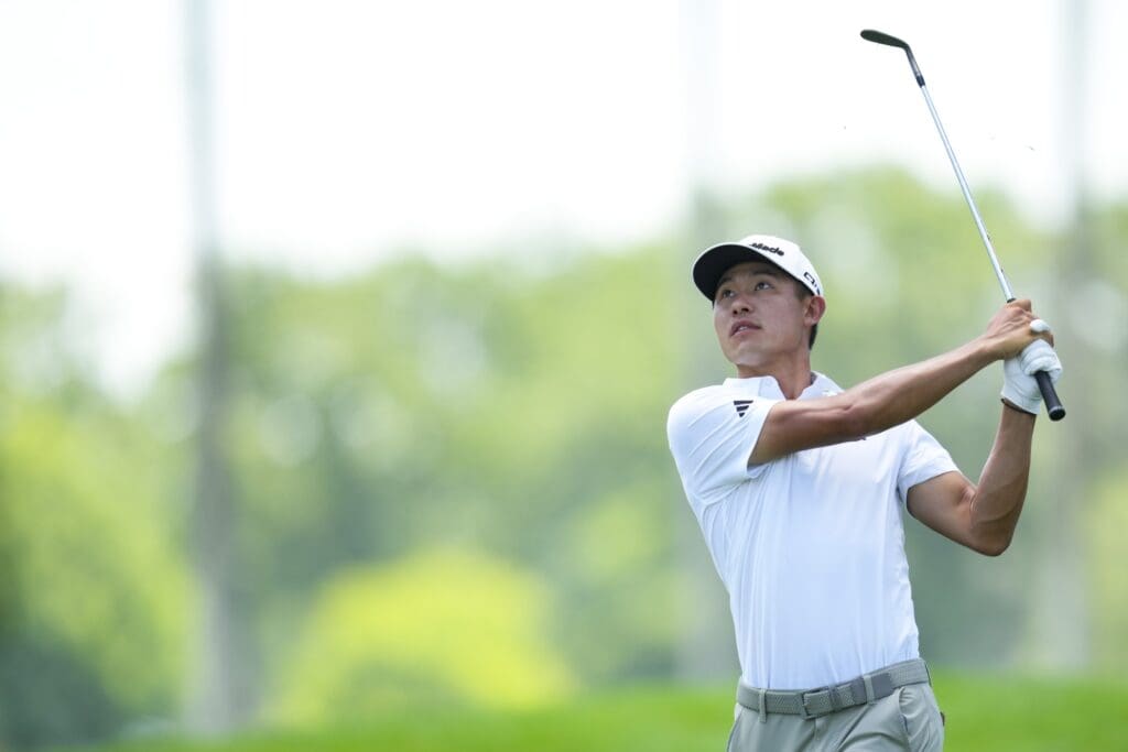Jun 28, 2025; Detroit, Michigan, USA; Collin Morikawa plays his shot on the fourth hole during the third round of the Rocket Mortgage Classic golf tournament.