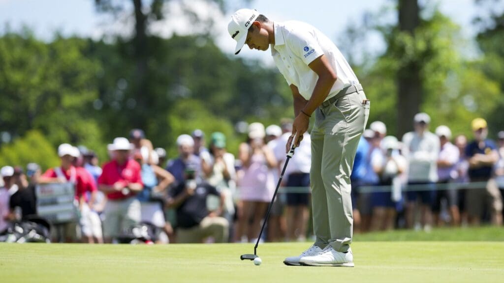 Jun 28, 2025; Detroit, Michigan, USA; Collin Morikawa putts on the fourth green during the third round of the Rocket Mortgage Classic golf tournament.