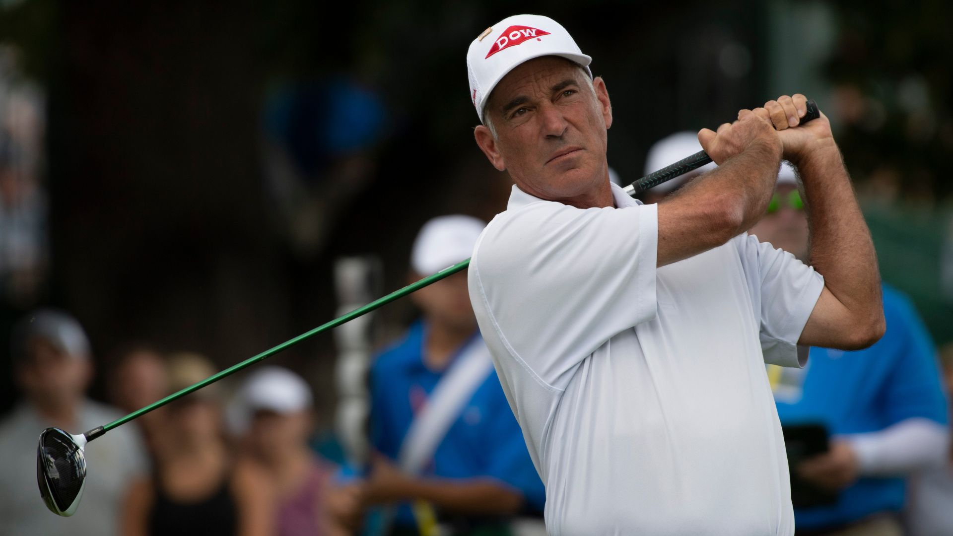 Jun 28, 2018; Colorado Springs, CO, USA; Corey Pavin follows through on his tee shot at the first hole during the first round of the U.S. Senior Open golf tournament at the Broadmoor.