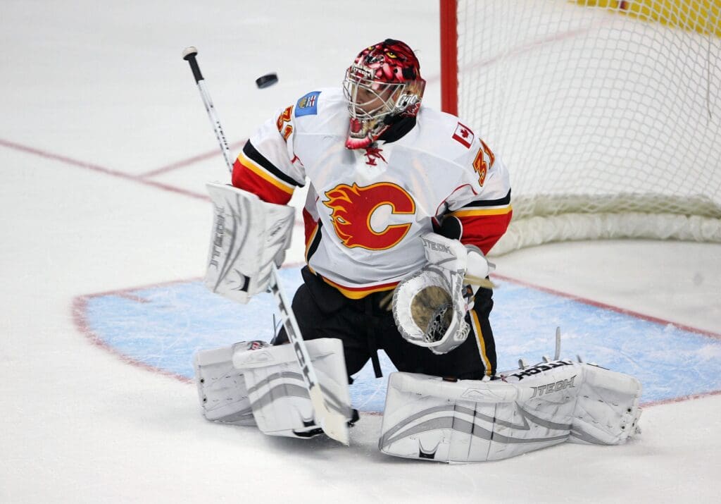 February 29, 2008; Anaheim CA, USA; Calgary Flames goalie Curtis Joseph (31) blocks a shot against the Anaheim Ducks during the third period at the Honda Center in Anaheim CA. Anaheim defeated Calgary 3-1.