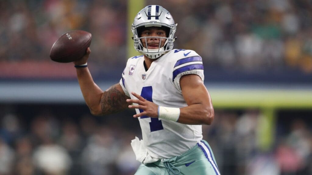 Oct 8, 2017; Arlington, TX, USA; Dallas Cowboys quarterback Dak Prescott (4) throws on the run against the Green Bay Packers at AT&T Stadium.