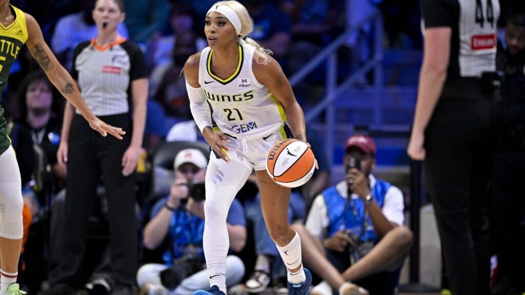May 19, 2025; Arlington, Texas, USA; Dallas Wings guard DiJonai Carrington (21) in action during the game between the Dallas Wings and the Seattle Storm at College Park Center.