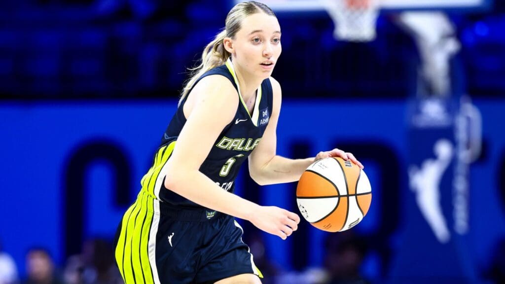 Jul 30, 2025; Arlington, Texas, USA; Dallas Wings guard Paige Bueckers (5) dribbles against the Atlanta Dream during the second half at College Park Center. 