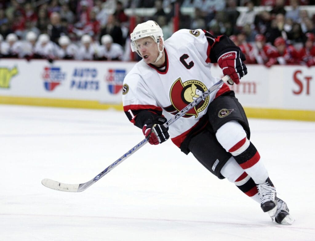 February 27, 2007; Raleigh, NC, USA; Ottawa Senators right wing Daniel Alfredsson (11) against the Carolina Hurricanes during the 3rd period at the RBC Center in Raleigh, NC. The Senators defeated the Hurricanes 4-2.