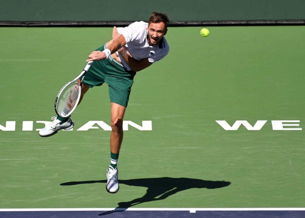 Oct 13, 2021; Indian Wells, CA, USA; Daniil Medvedev (RUS) serves against Grigor Dimitrov (BUL) in his fourth round match during the BNP Paribas Open at the Indian Wells Tennis Garden.
