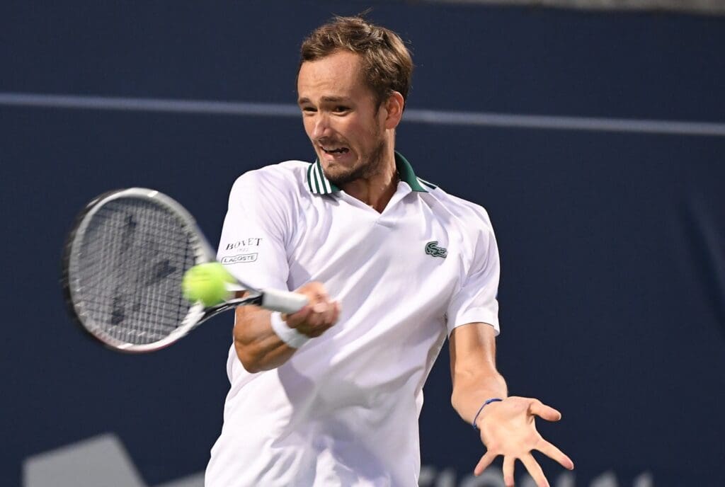 Aug 13, 2021; Toronto, Ontario, Canada; Daniil Medvedev of Russia plays a shot against Hubert Hurkacz of Poland during the quarter finals of the National Bank Open at Aviva Centre.