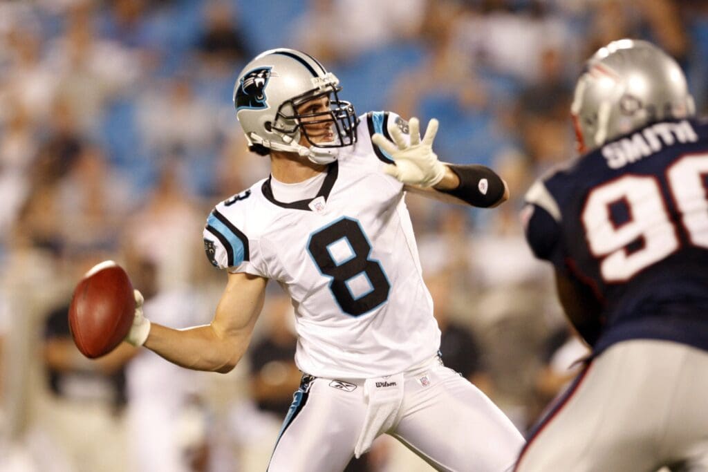 Aug 24, 2007, Charlotte, NC, USA; Carolina Panthers (8) David Carr passes as New England Patriots defensive lineman (90) Le Kevin Smith defends in the Patriots 24-7 pre-season victory against the Panthers at Bank of America Stadium