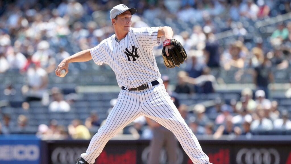 July 1, 2012; Bronx, NY, USA; New York Yankees former pitcher David Cone throws a pitch during the 66th annual Old Timers Day game at Yankee Stadium.