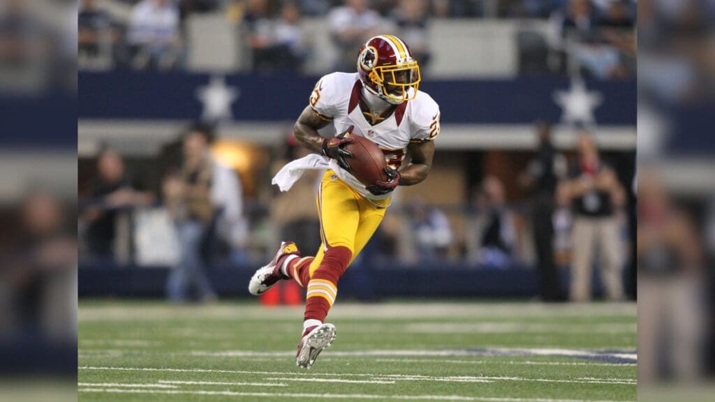 Nov 22, 2012; Arlington, TX, USA; Washington Redskins cornerback DeAngelo Hall (23) returns an interception during the game against the Dallas Cowboys on Thanksgiving at Cowboys Stadium.